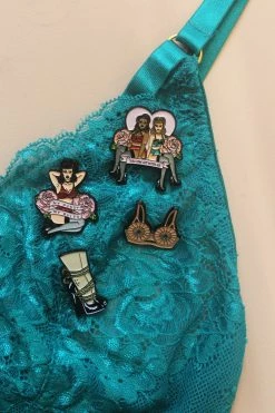 Playful Promises Bullet Bra Enamel Pin